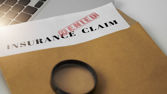 Document  and magnifying glass on white table,